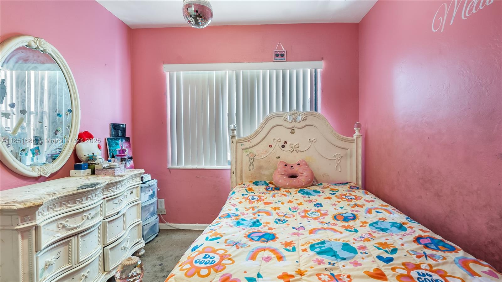 6528 Southwest 26th Street Miramar, FL 33023 - Photo 21 of 29 a bedroom with a bed and wooden floor