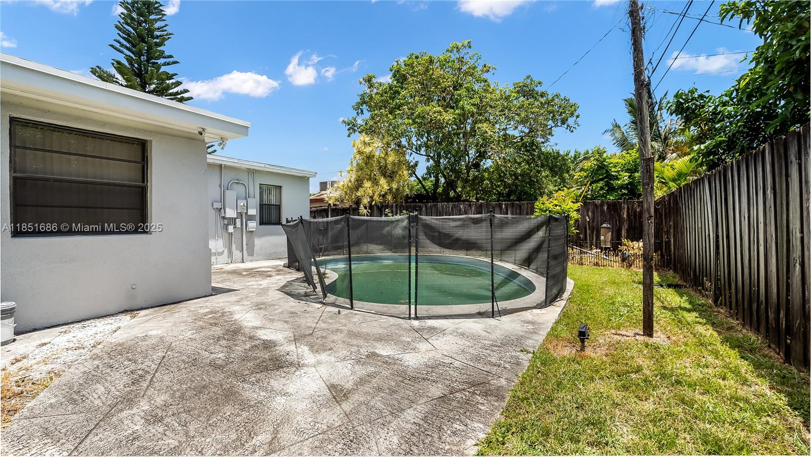 6528 Southwest 26th Street Miramar, FL 33023 - Photo 26 of 29 a view of a small house in the backyard