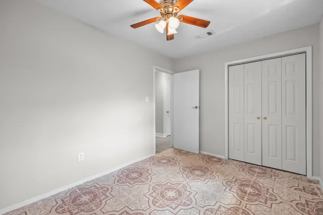 a view of a room with a large window