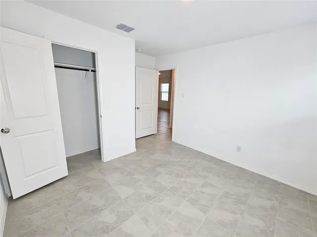 an empty room with closet