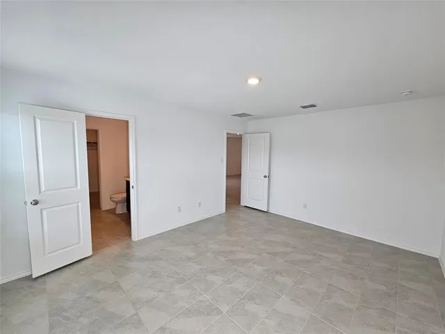 an empty room with an entryway