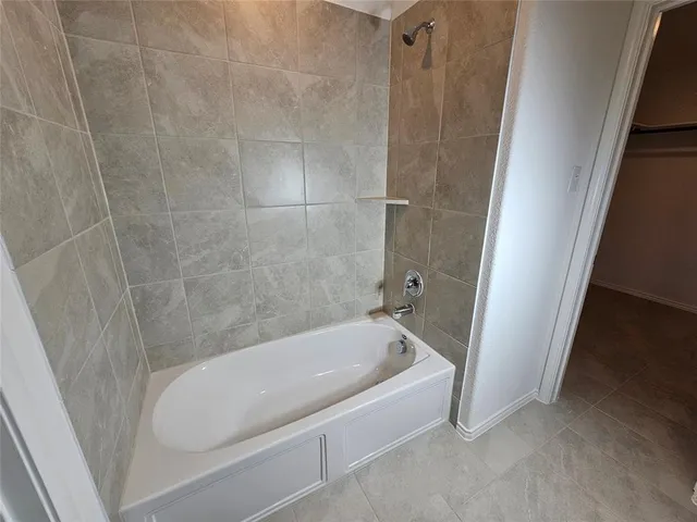 a bathroom with a bathtub