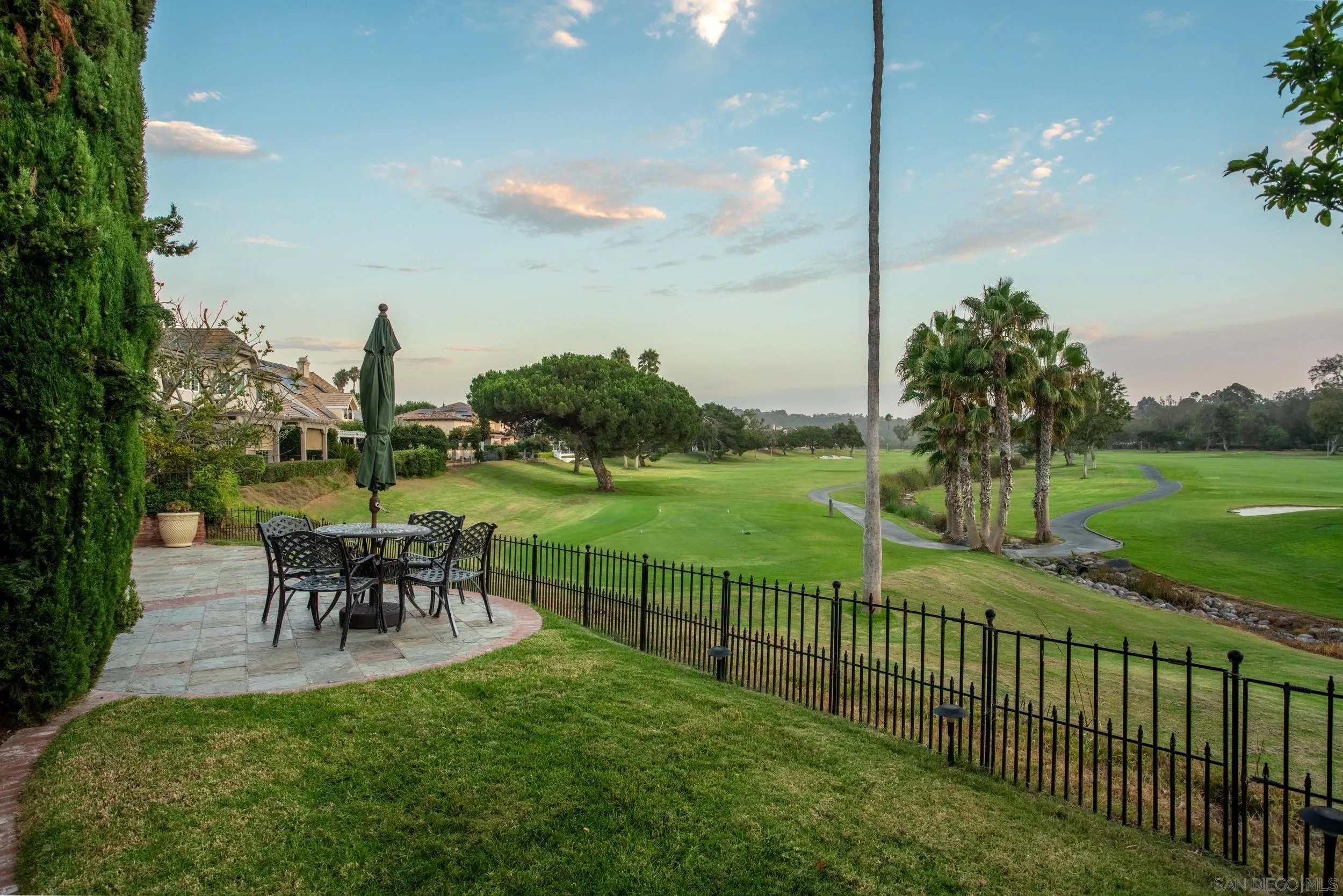 16056 Avenida Calma Rancho Santa Fe, CA 92091 - Photo 15 of 51 a view of a garden with a table and chairs