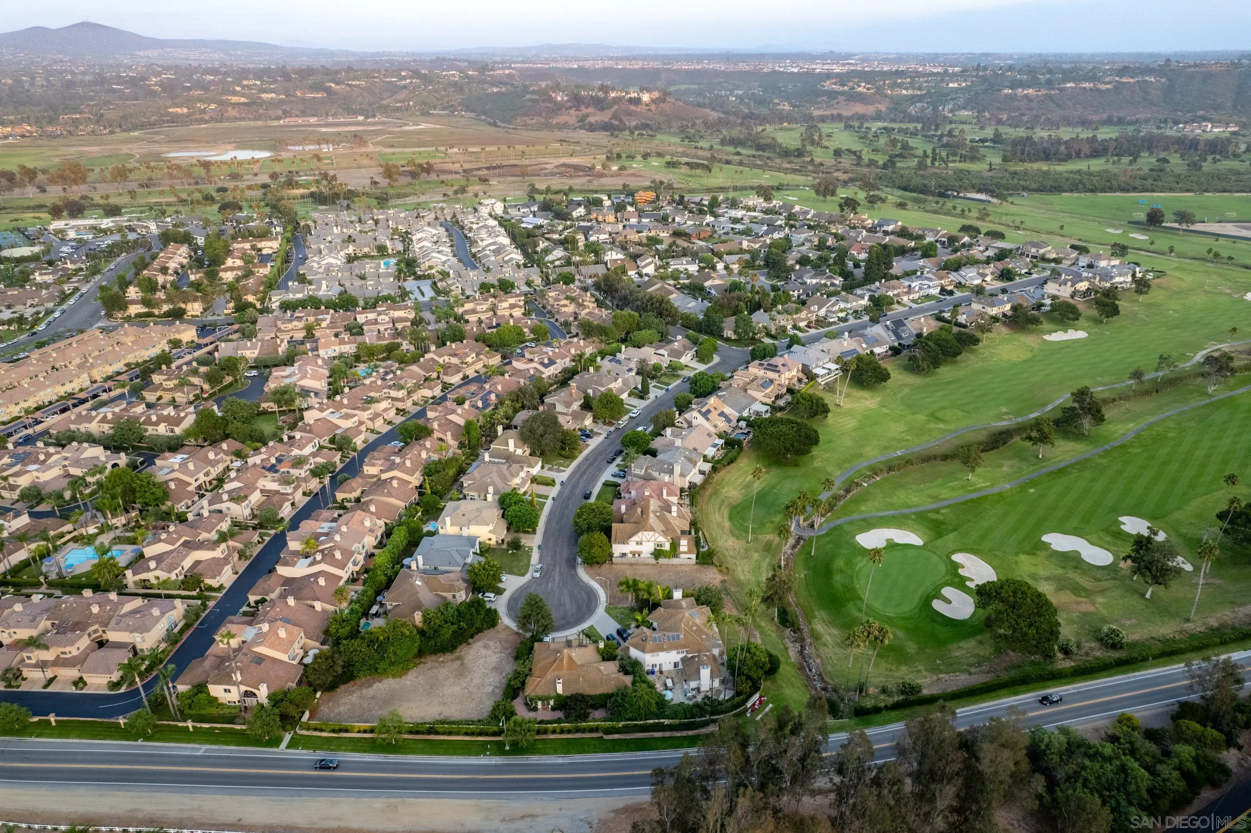 16056 Avenida Calma Rancho Santa Fe, CA 92091 - Photo 18 of 51 an aerial view of residential houses with outdoor space and trees