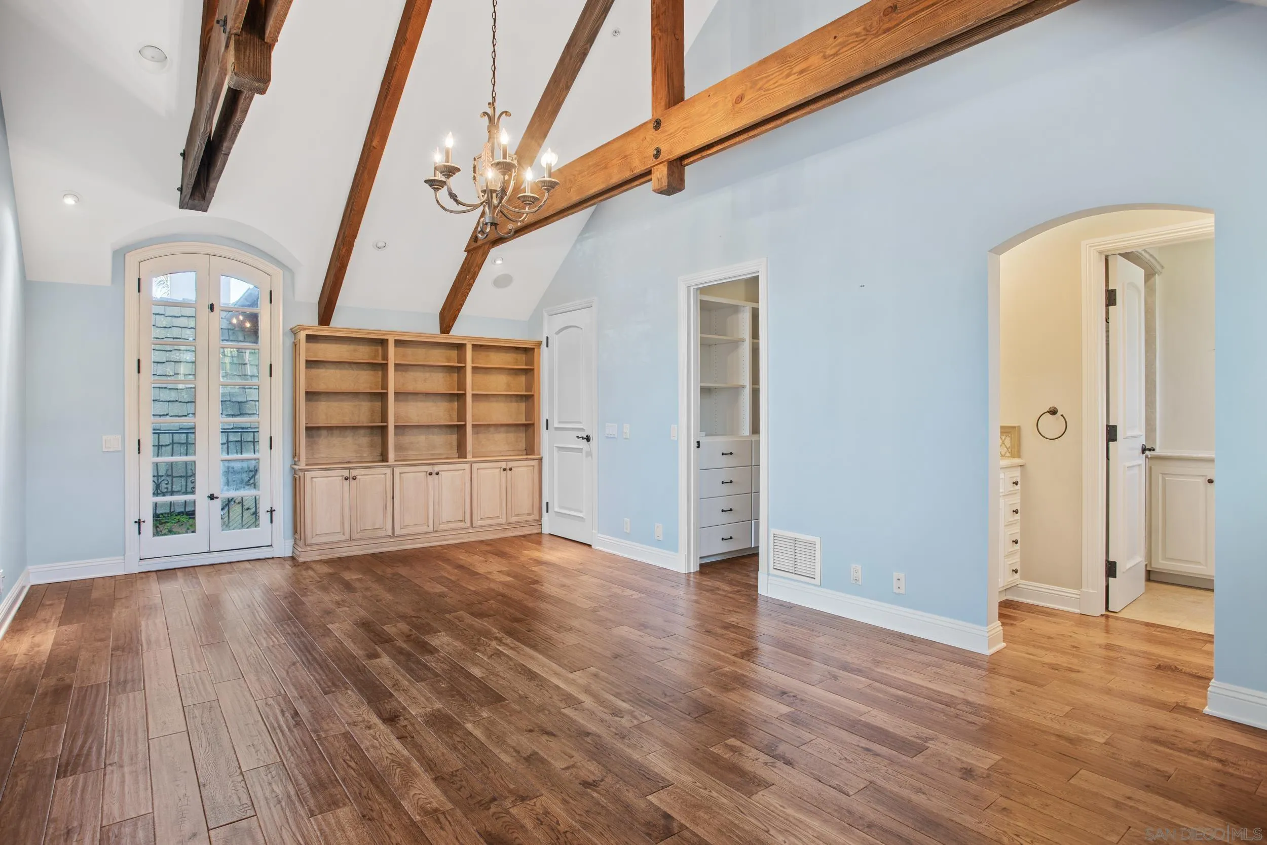16056 Avenida Calma Rancho Santa Fe, CA 92091 - Photo 31 of 51 a view of a livingroom with wooden floor and door