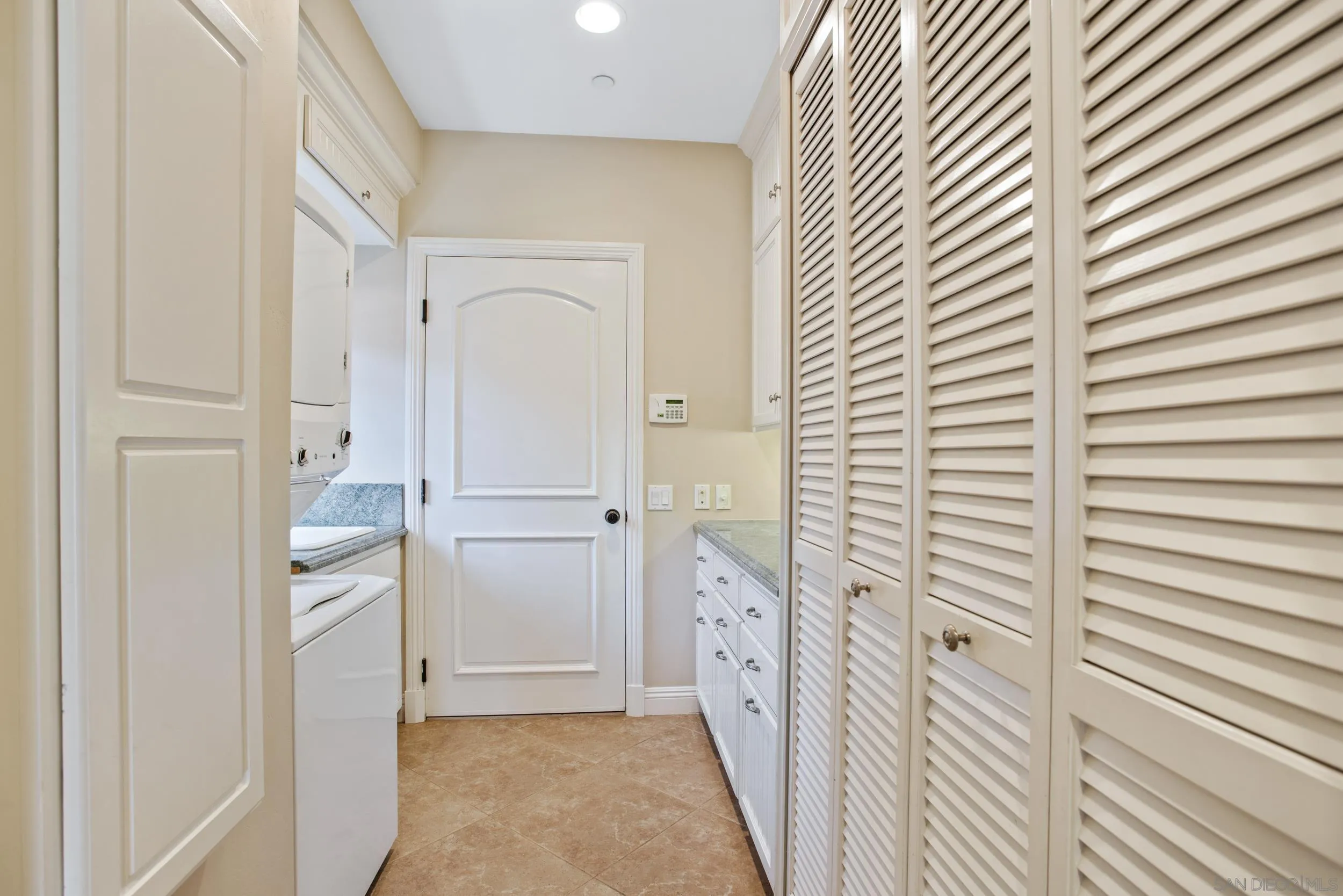 16056 Avenida Calma Rancho Santa Fe, CA 92091 - Photo 37 of 51 a view of a hallway with closet and entryway