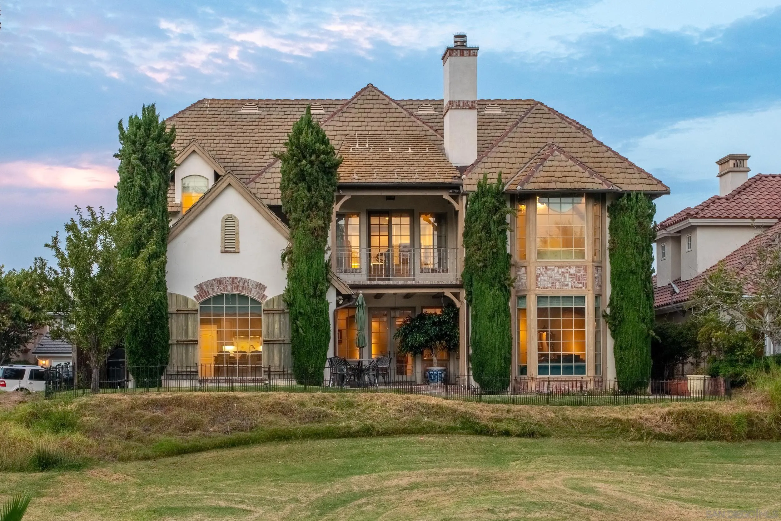 16056 Avenida Calma Rancho Santa Fe, CA 92091 - Photo 39 of 51 a front view of a house with a yard