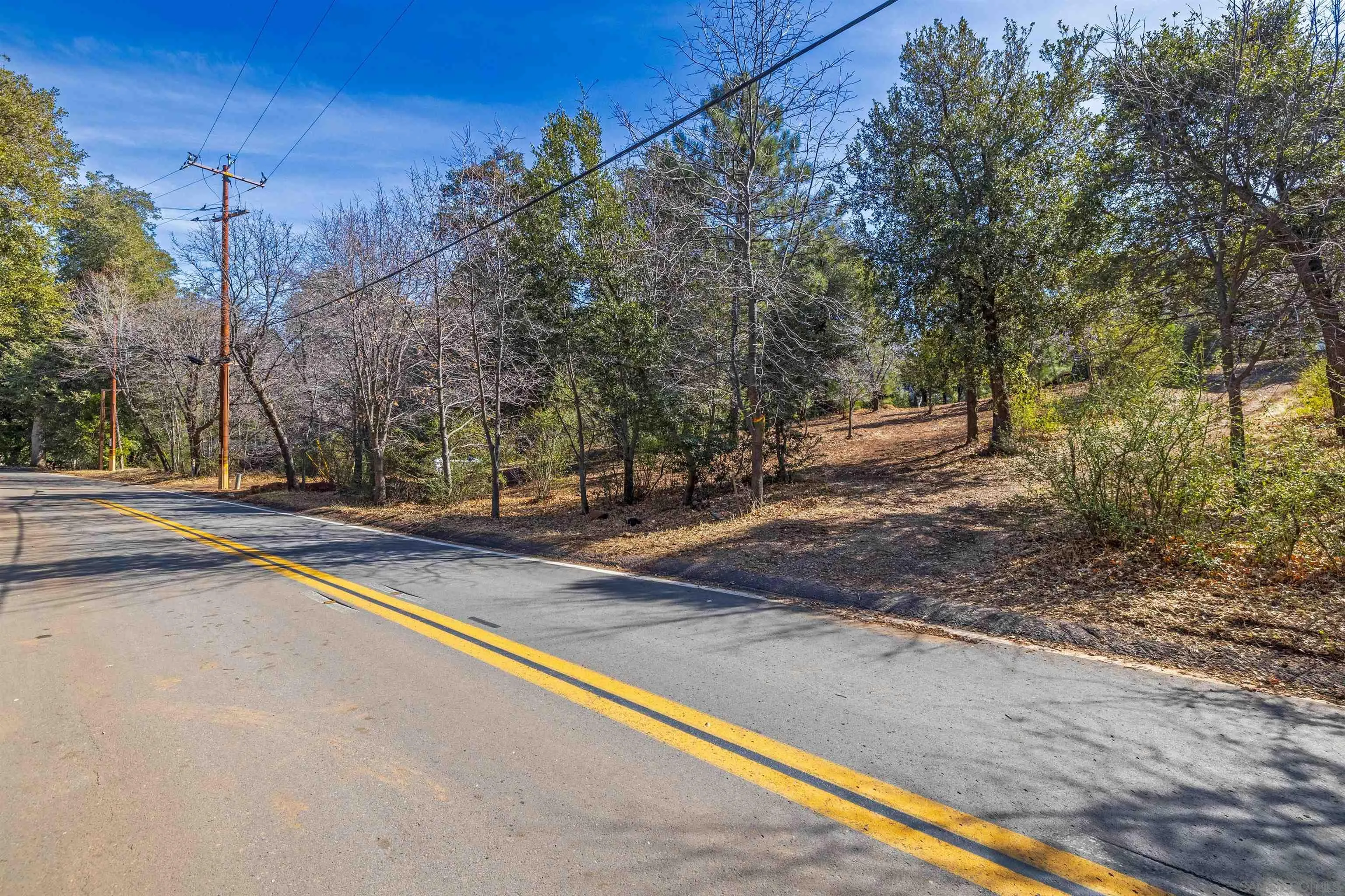0 Frisius Drive, Unit 42 Julian, CA 92036 - Photo 4 of 12 a view of a street with trees