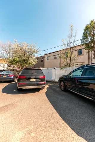 a view of cars parked in a parking lot