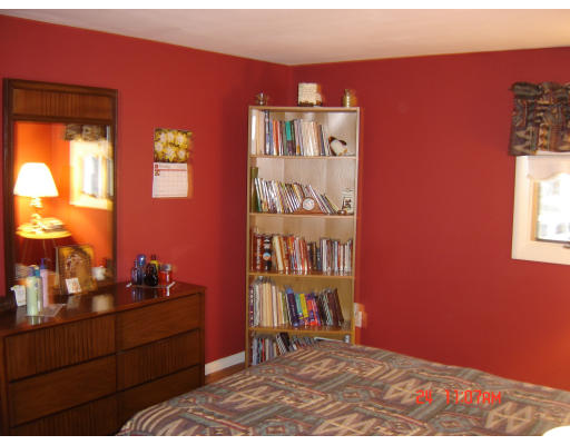22 Eastmont Road Boston, MA 02136 - Photo 8 of 12 a room with bookshelf and window