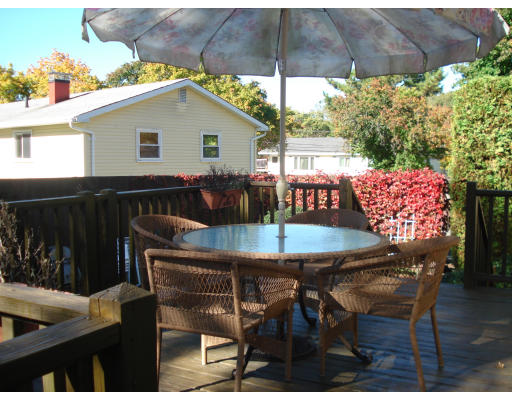 22 Eastmont Road Boston, MA 02136 - Photo 10 of 12 a table and chairs in the patio
