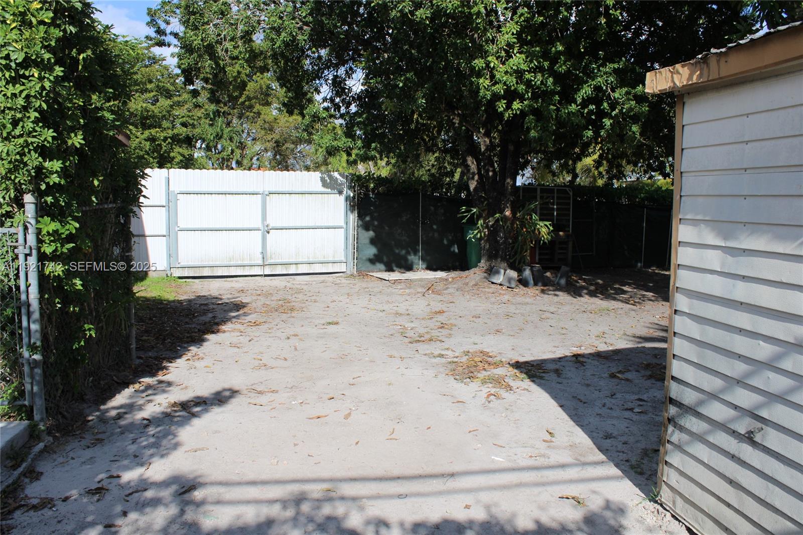 4940 Southwest 114th Avenue Miami, FL 33165 - Photo 27 of 31 a view of a backyard of the house