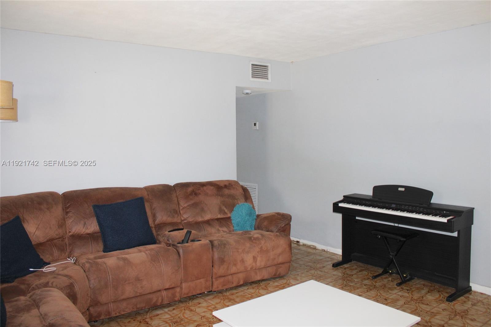 4940 Southwest 114th Avenue Miami, FL 33165 - Photo 8 of 31 a living room with furniture