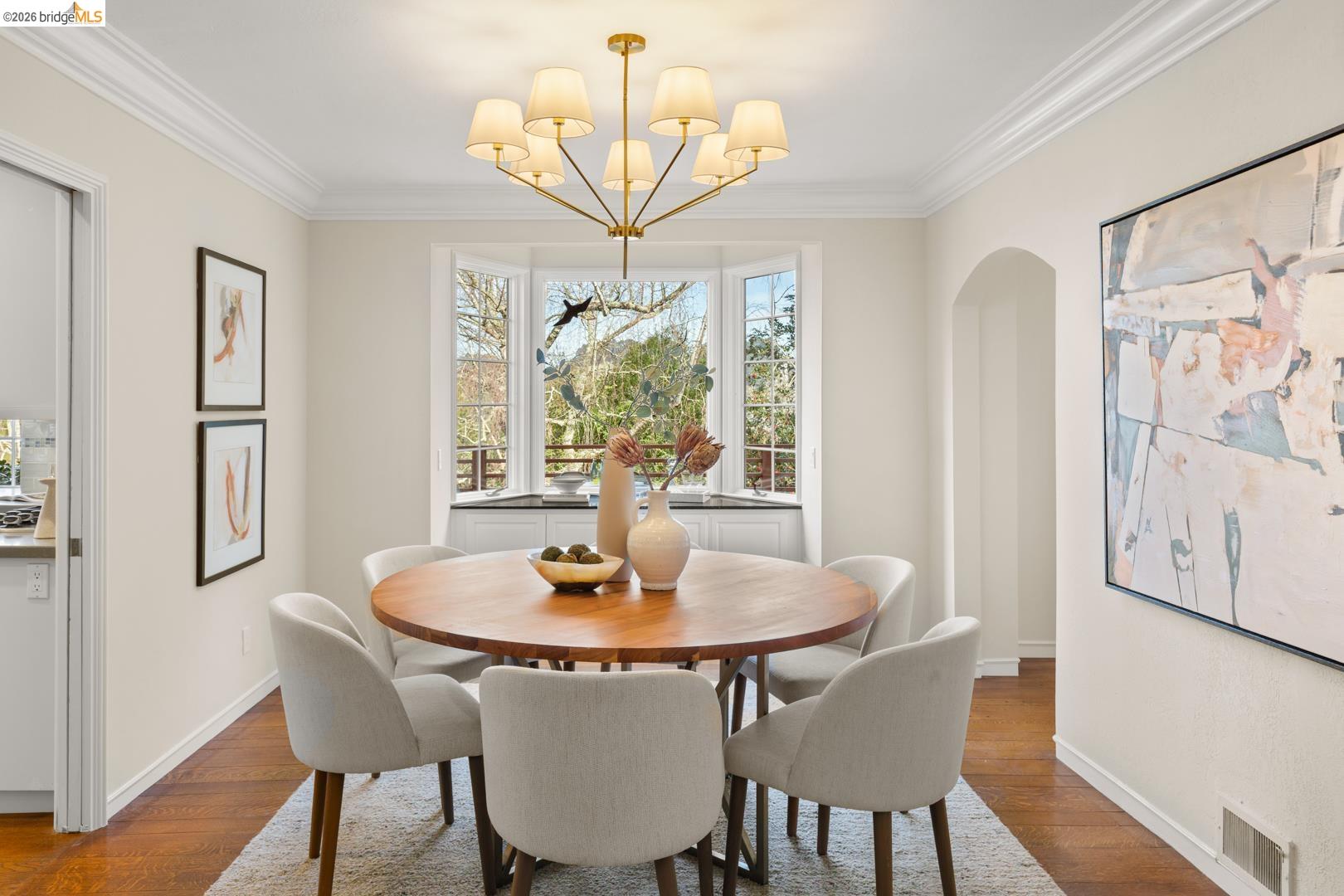 1123 Park Hills Road Berkeley, CA 94708 - Photo 12 of 47 a dining room with furniture a chandelier and wooden floor