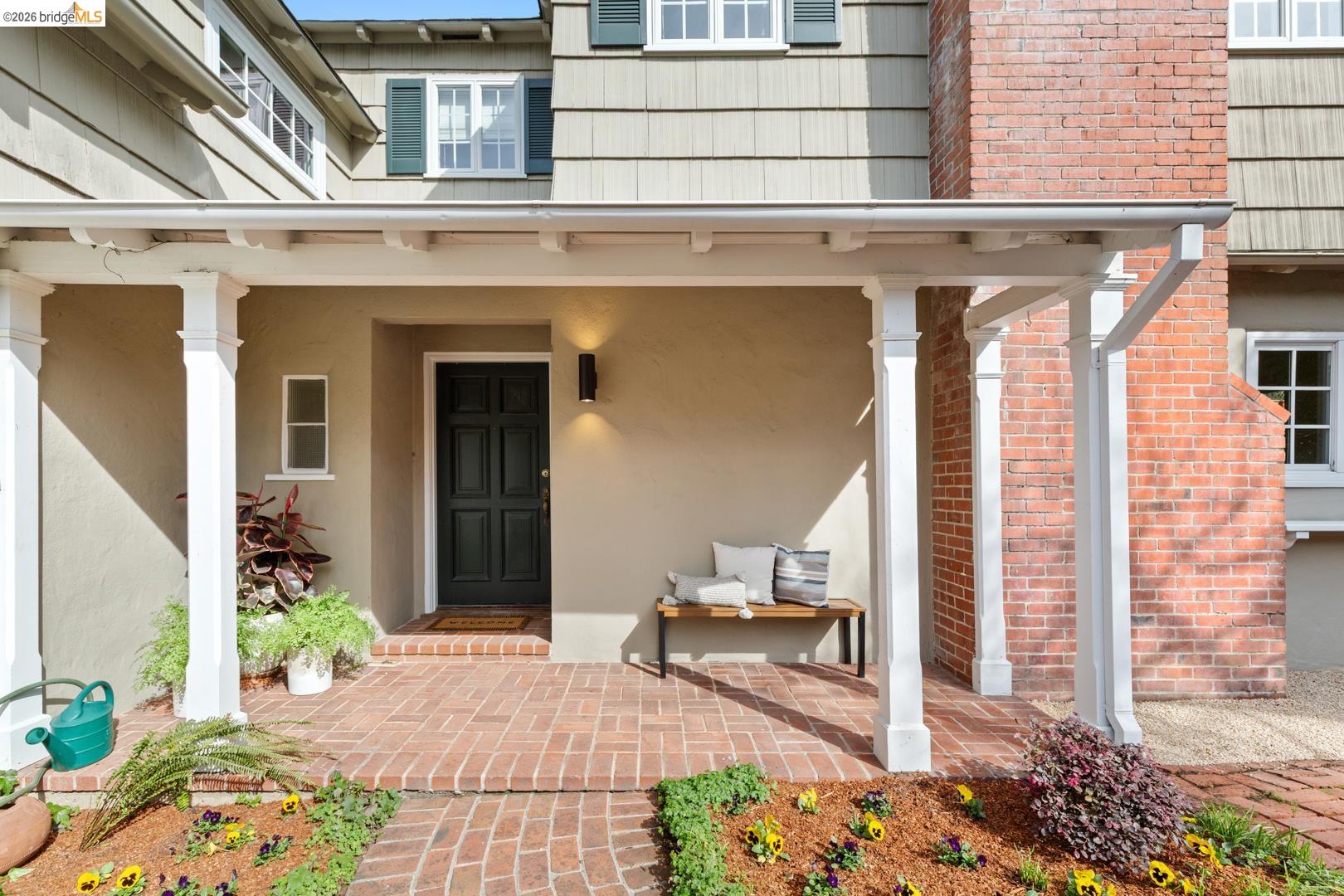 1123 Park Hills Road Berkeley, CA 94708 - Photo 4 of 47 a front view of a house with a garden