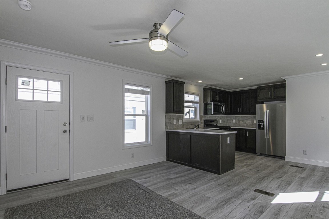 847 Airport Road, Unit 12 Breckenridge, CO 80424 - Photo 7 of 32 a kitchen with stainless steel appliances granite countertop a stove and a refrigerator