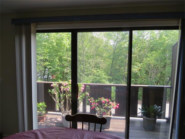 18 Mountain Gate Road, Unit 18 Ashland, MA 01721 - Photo 7 of 12 a view of a living room with furniture and a potted plant
