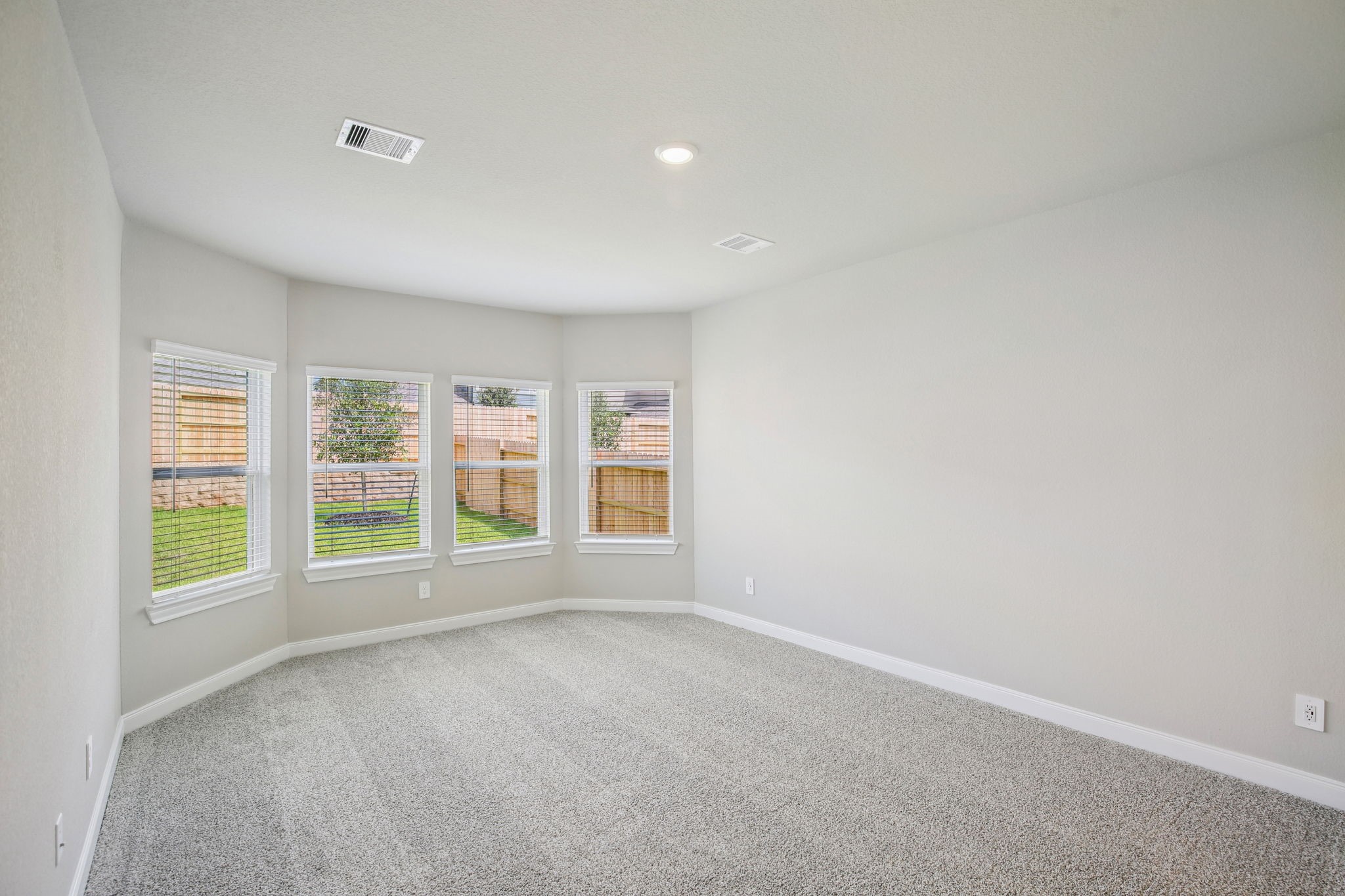 1660 Hopson Ranch Drive Conroe, TX 77301 - Photo 12 of 37 an empty room with windows