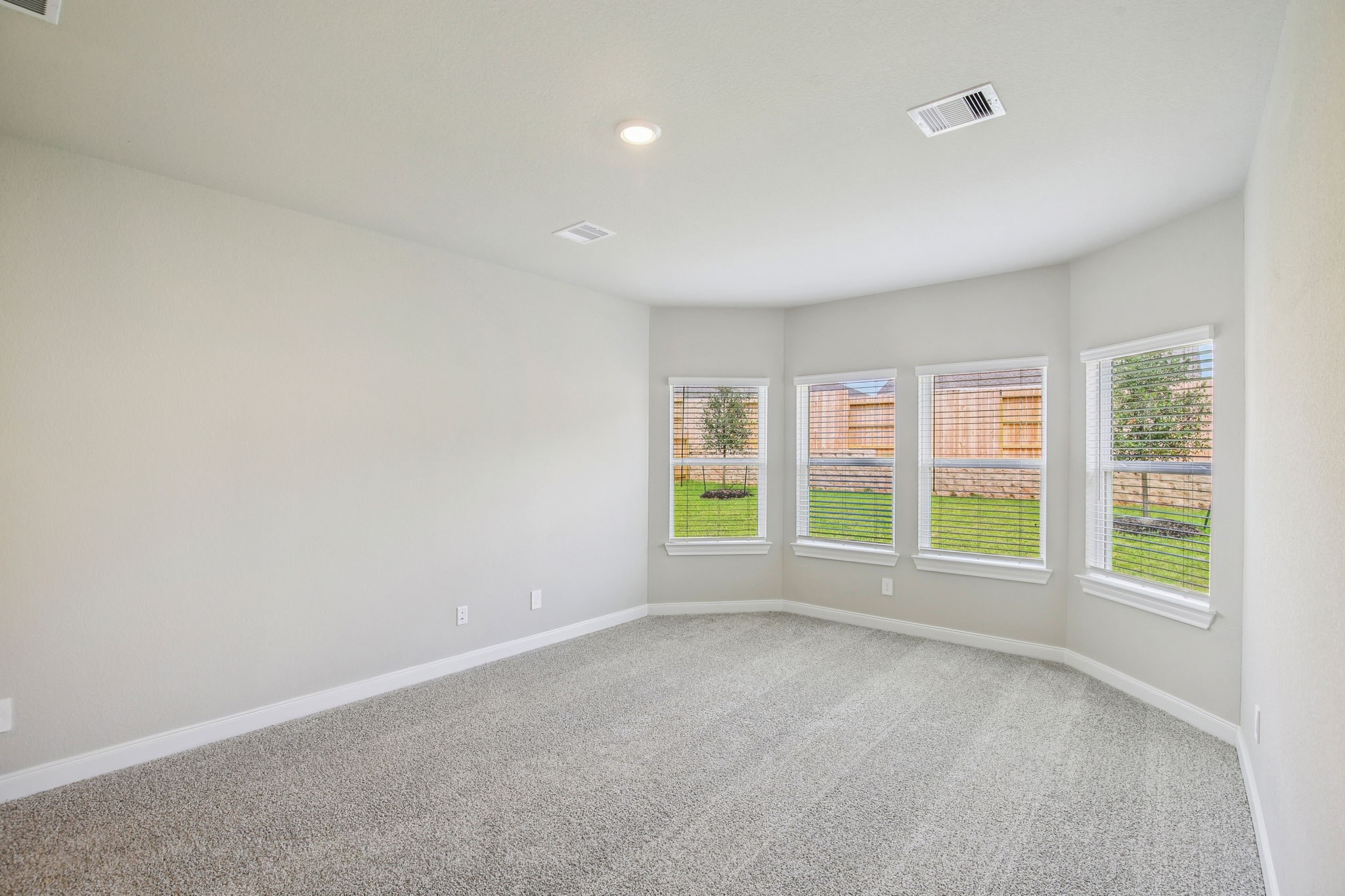 1660 Hopson Ranch Drive Conroe, TX 77301 - Photo 13 of 37 an empty room with windows