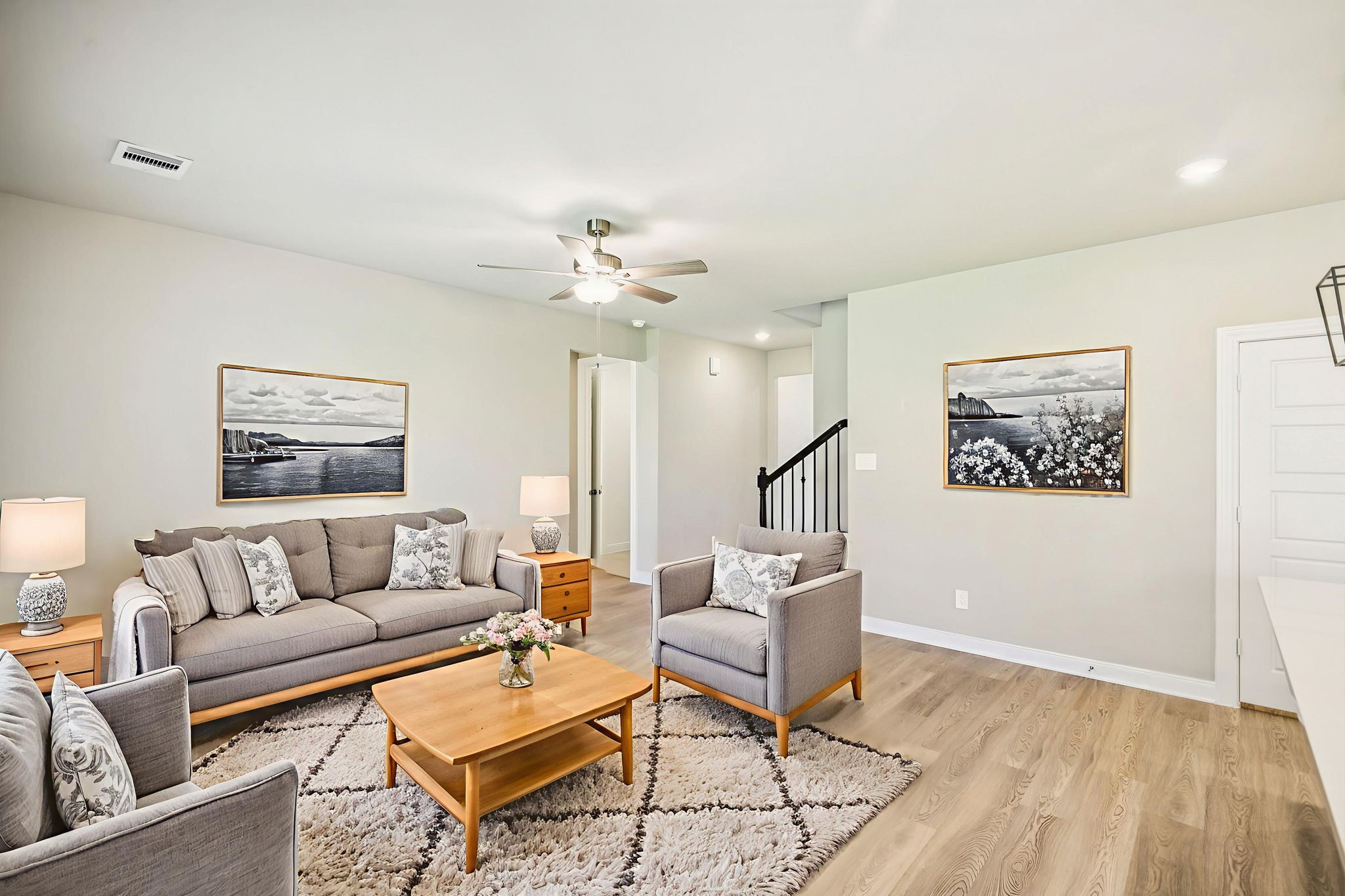 1660 Hopson Ranch Drive Conroe, TX 77301 - Photo 7 of 37 a living room with furniture and a wooden floor