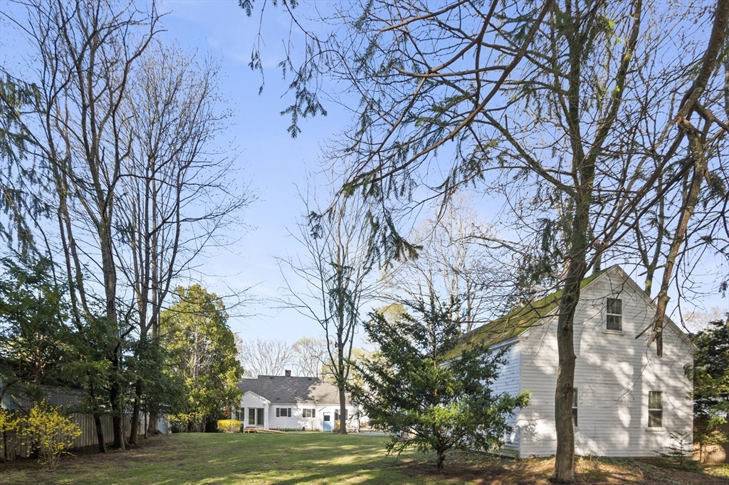 110 Linden Street Hamilton, MA 01982 - Photo 23 of 25 a view of a field with trees around