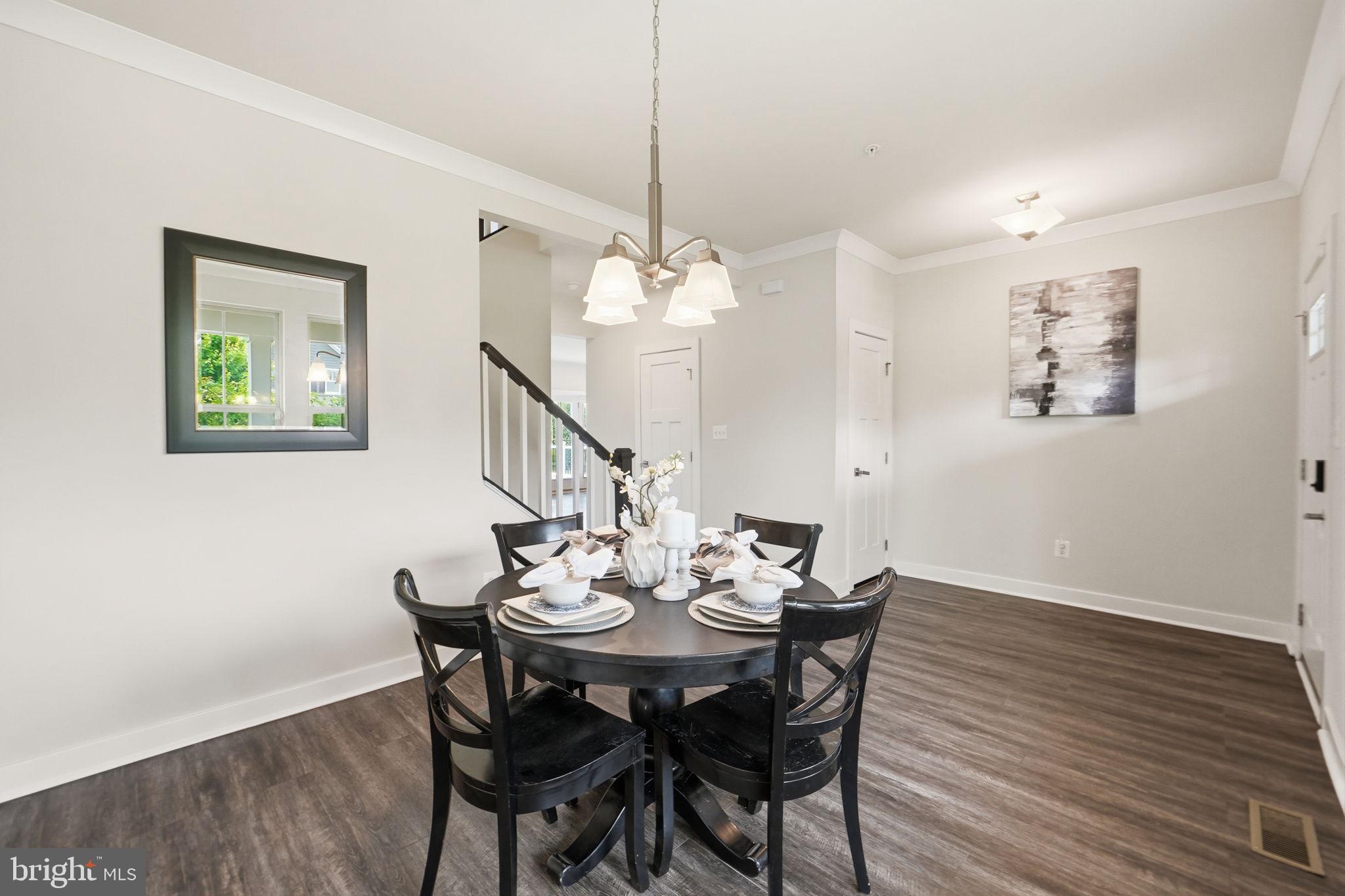 2269 River Birch Road Dumfries, VA 22026 - Photo 7 of 29 Elegant dining space with modern charm.