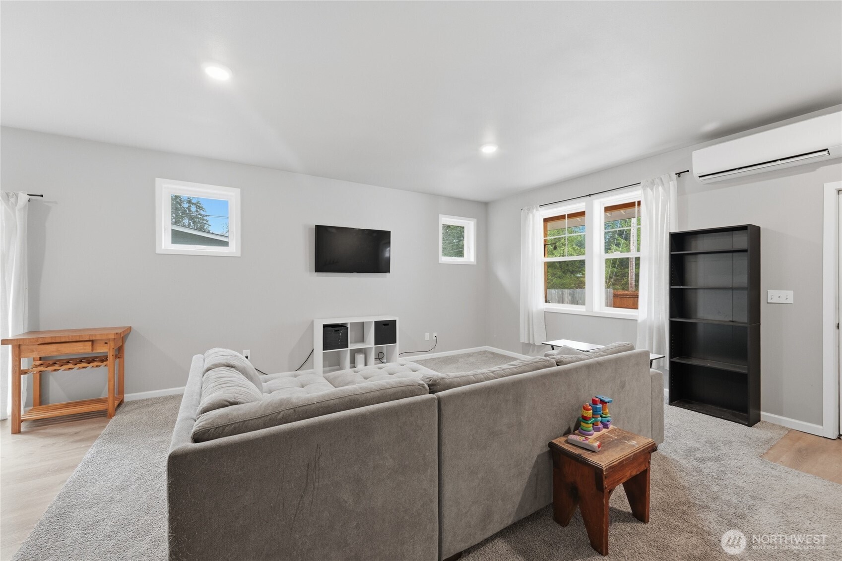 8470 Golden Valley Drive Maple Falls, WA 98266 - Photo 12 of 30 a living room with furniture and a flat screen tv