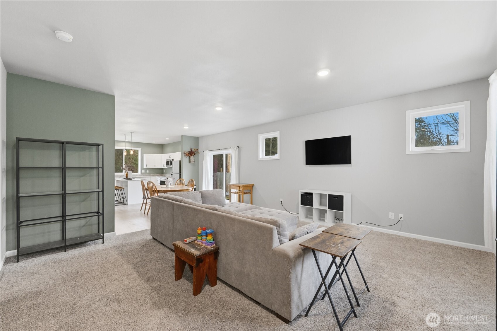 8470 Golden Valley Drive Maple Falls, WA 98266 - Photo 9 of 30 a living room with furniture and a flat screen tv