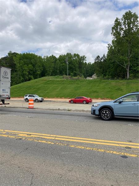 0 Harmony Drive Canton, GA 30115 - Photo 3 of 6 a view of a car is parked on the side of the road with city view