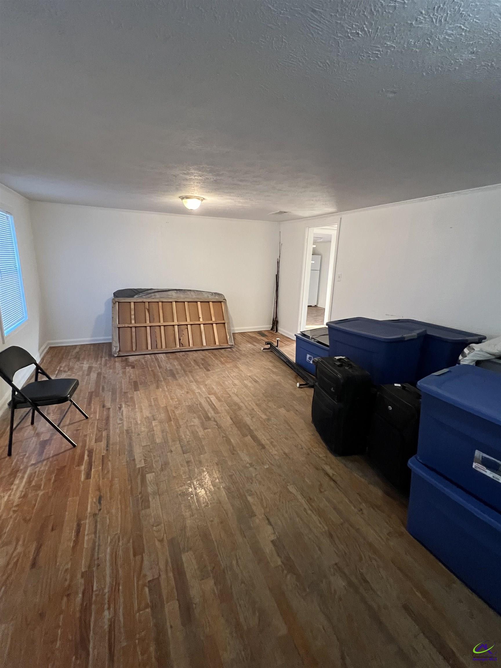 3281 State Rte 126 Dublin, GA 31021 - Photo 8 of 22 a bedroom with a bed and a dresser