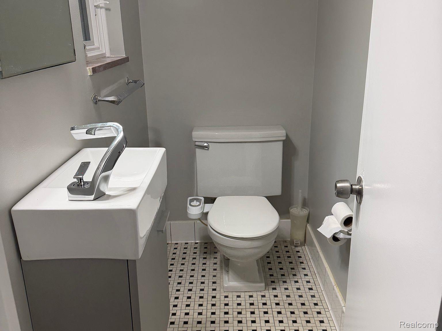 3520 Rayburn Road Bloomfield Hills, MI 48304 - Photo 14 of 26 Modern rectangular vessel sink with a chrome faucet