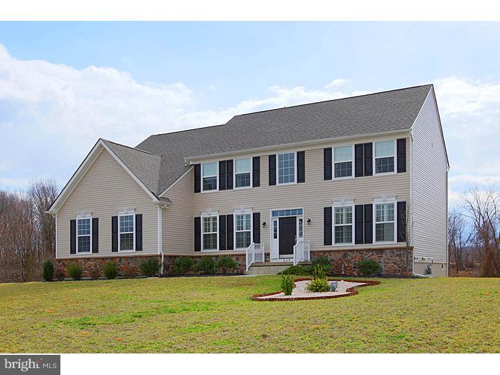 830 Derius Drive Mickleton, NJ 08056 - Photo 1 of 24 a front view of a house with a yard