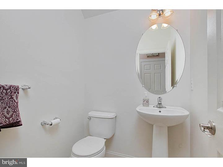 830 Derius Drive Mickleton, NJ 08056 - Photo 13 of 24 a bathroom with a sink mirror and toilet