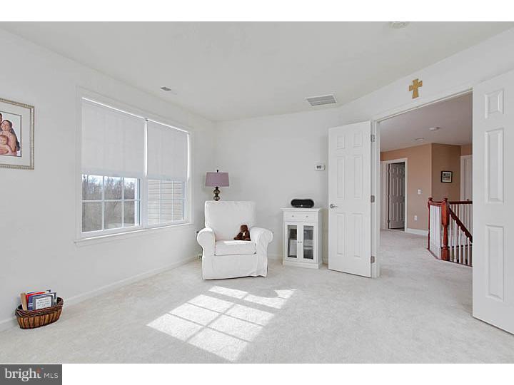 830 Derius Drive Mickleton, NJ 08056 - Photo 14 of 24 a living room with furniture and a table