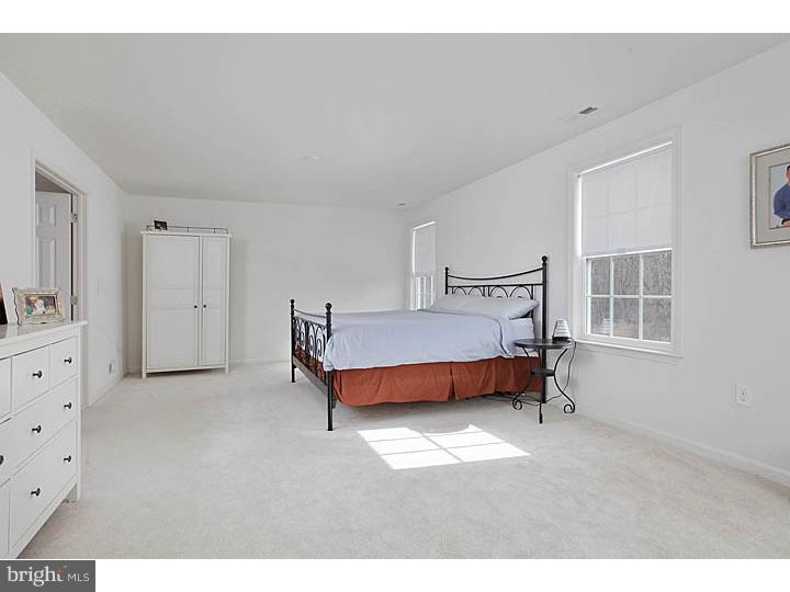 830 Derius Drive Mickleton, NJ 08056 - Photo 15 of 24 a bedroom with a bed and window