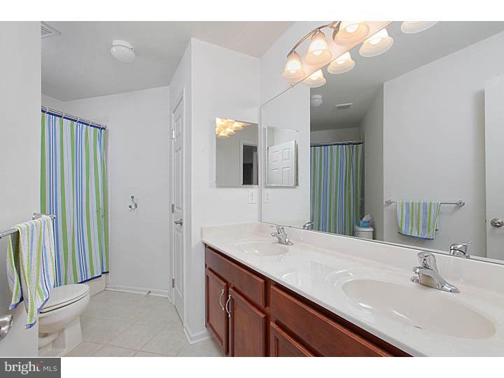 830 Derius Drive Mickleton, NJ 08056 - Photo 19 of 24 a bathroom with a sink vanity and mirror