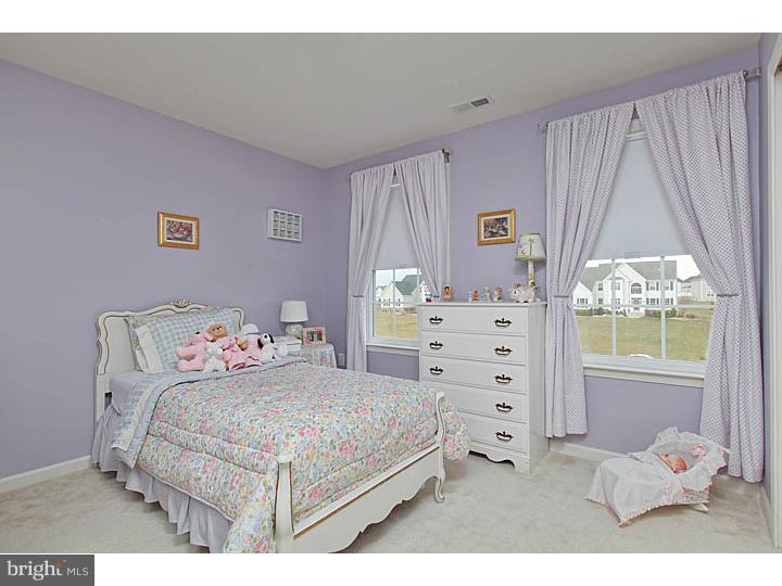 830 Derius Drive Mickleton, NJ 08056 - Photo 21 of 24 a bedroom with a bed and a window