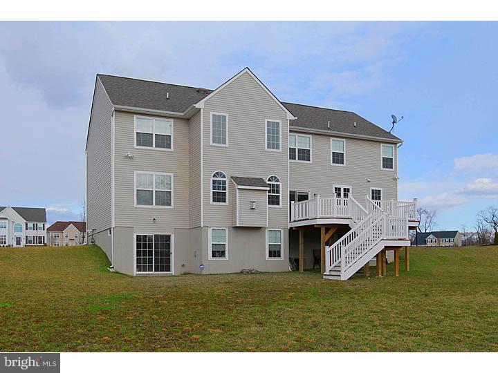 830 Derius Drive Mickleton, NJ 08056 - Photo 23 of 24 a aerial view of a house with a yard and balcony