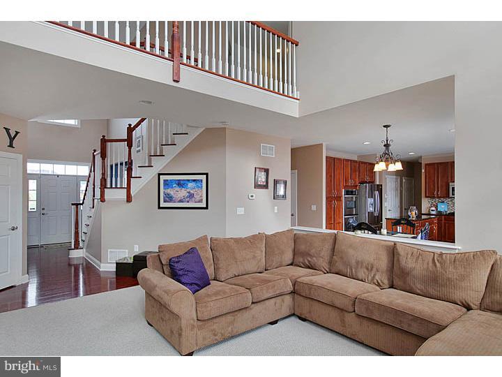 830 Derius Drive Mickleton, NJ 08056 - Photo 10 of 24 a view of a livingroom with furniture and a ceiling fan