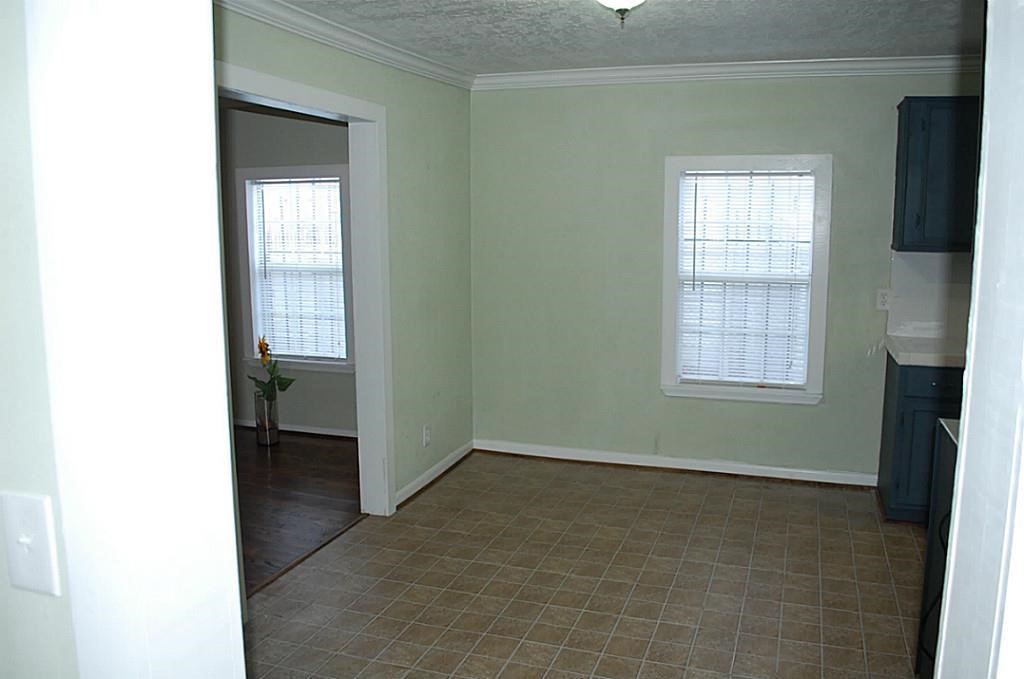 3804 Garrow Street Houston, TX 77003 - Photo 11 of 22 a view of an empty room with closet and a window