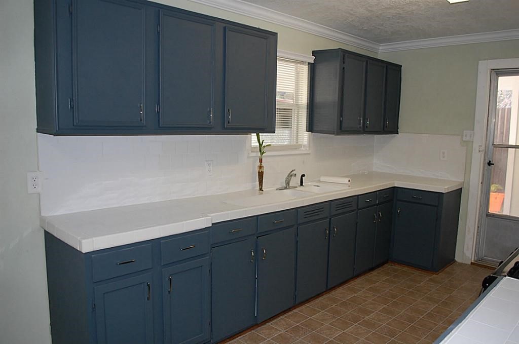 3804 Garrow Street Houston, TX 77003 - Photo 14 of 22 a kitchen with a sink and cabinets