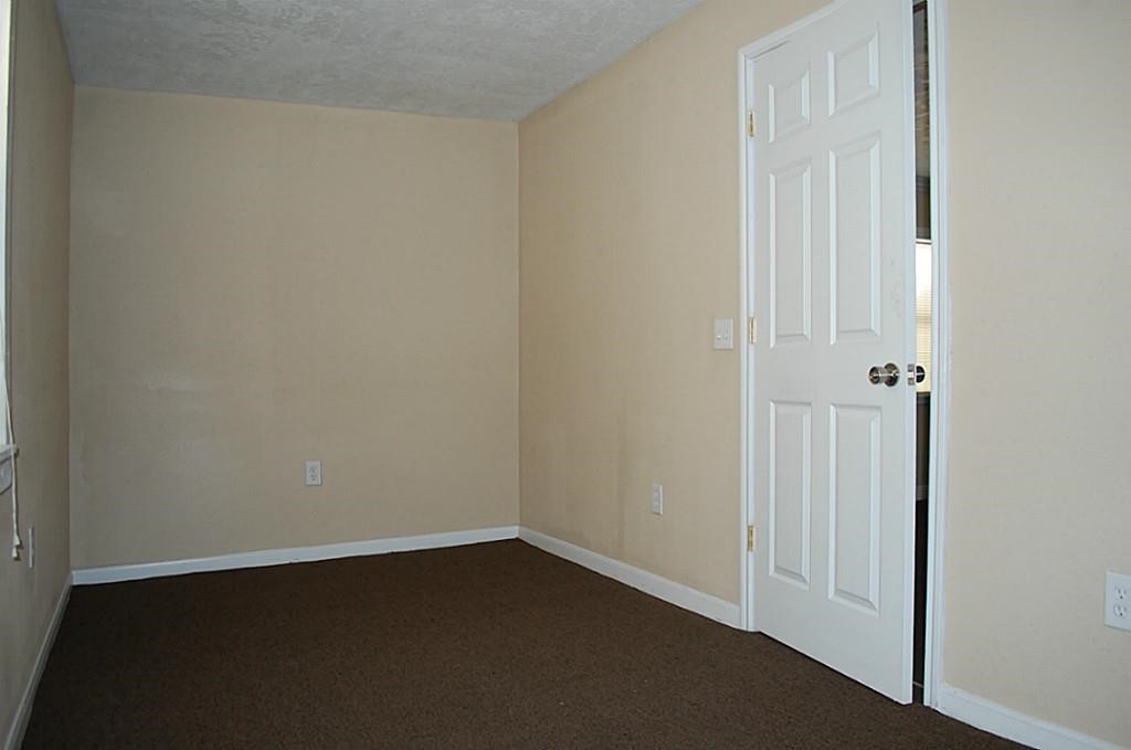 3804 Garrow Street Houston, TX 77003 - Photo 18 of 22 an empty room with wooden floor