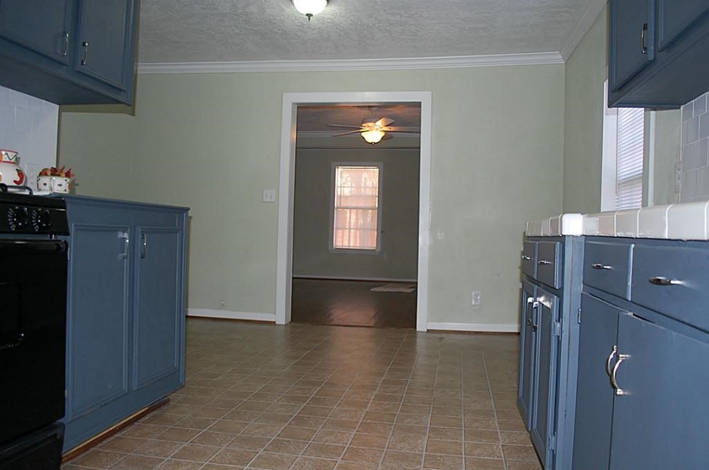 3804 Garrow Street Houston, TX 77003 - Photo 10 of 22 a view of a kitchen from the hallway