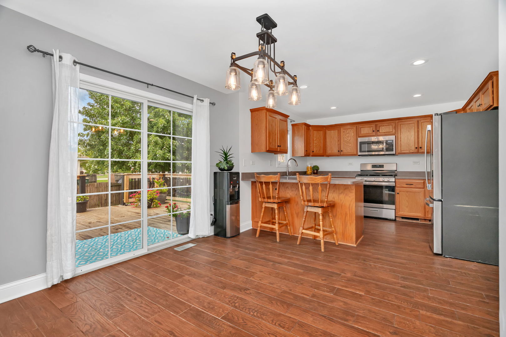 1110 Sandstone Drive Diamond, IL 60416 - Photo 13 of 49 a view of kitchen with microwave and cabinets
