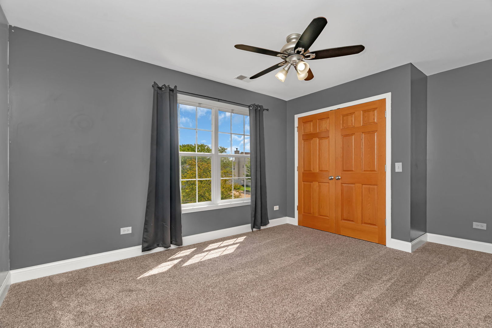 1110 Sandstone Drive Diamond, IL 60416 - Photo 26 of 49 a view of an empty room with a window