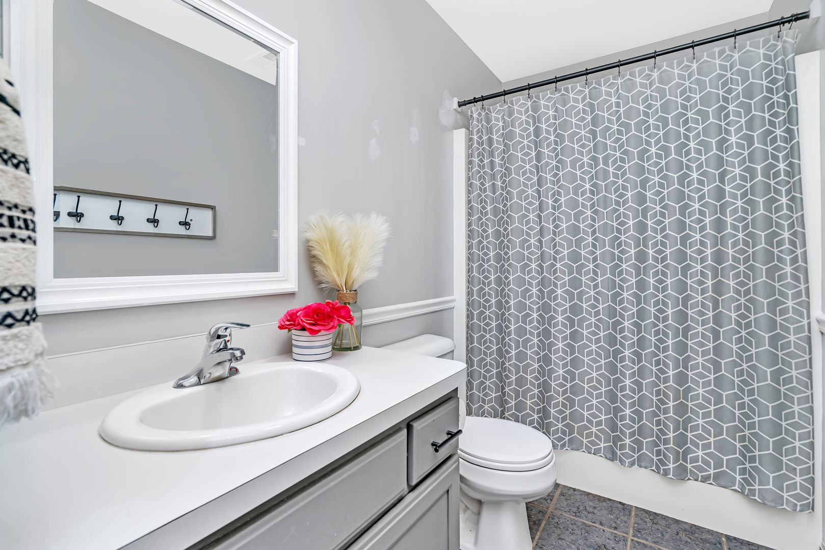 1110 Sandstone Drive Diamond, IL 60416 - Photo 29 of 49 a bathroom with a sink and a mirror