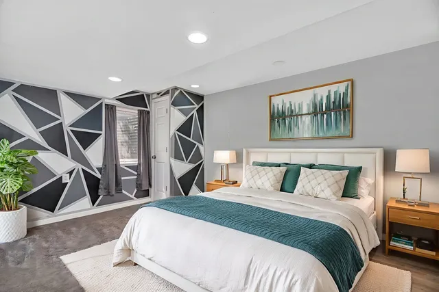 a view of a room with furniture window and wooden floor