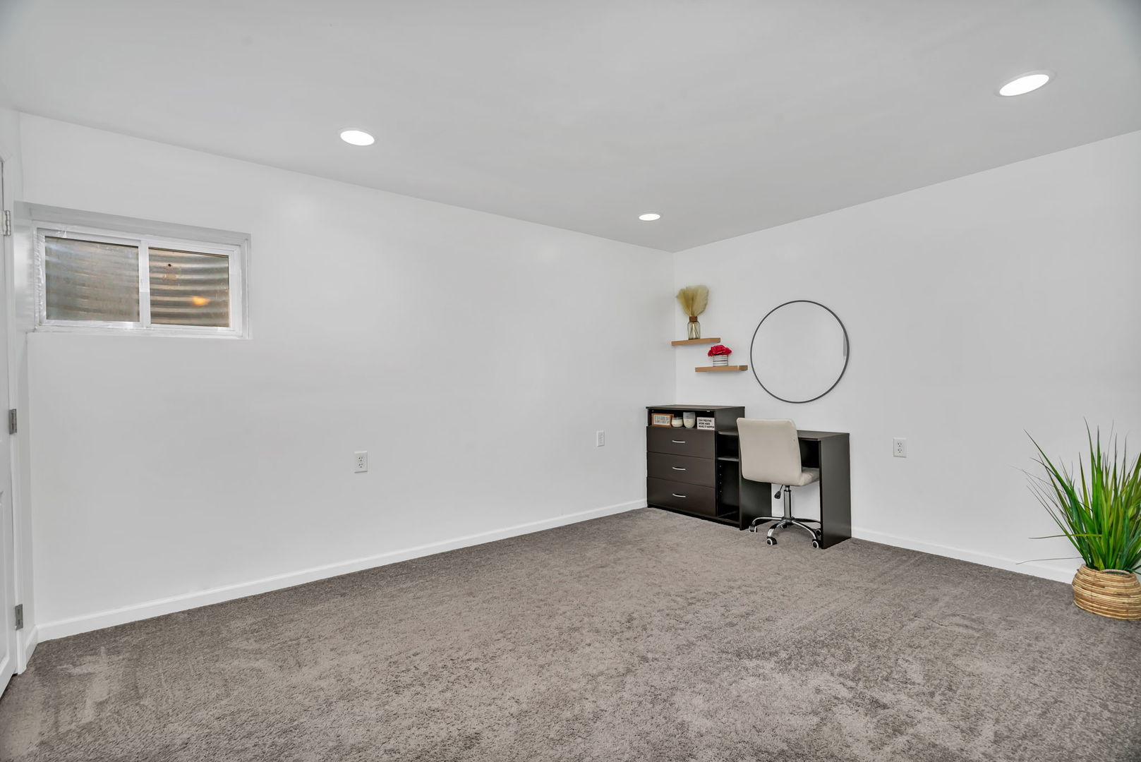 1110 Sandstone Drive Diamond, IL 60416 - Photo 34 of 49 a view of a room with furniture window and wooden floor