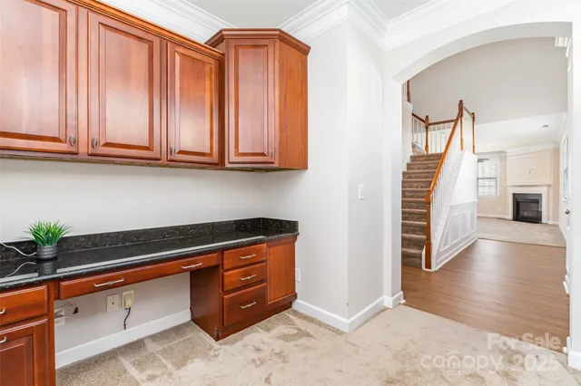 a view of cabinets and wooden floor