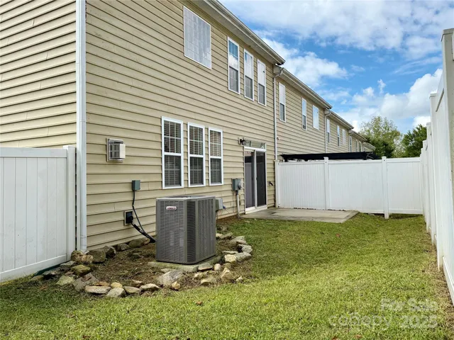 a view of a bench in a backyard